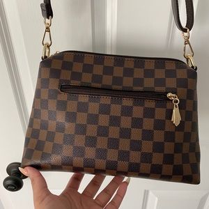 Checkered Brown Leather Crossbody Bag with strap.